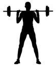 Young woman with barbell flexing muscles and making shoulder press squat in gym, silhouette