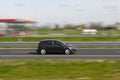 Sport car moving fast Royalty Free Stock Photo