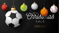 Sport christmas sale banner. Christmas card with sport baseball, basketball, football, tennis balls hang on a thread on black Royalty Free Stock Photo