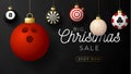 Sport christmas sale banner. Christmas card with sport baseball, basketball, football, tennis balls hang on a thread on black Royalty Free Stock Photo