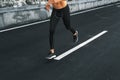 Sport. Close Up Of Male Legs Running On Road Outdoors. Royalty Free Stock Photo