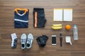 Sport clothes and accessories on a wooden background