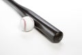 Sport Concepts. Closeup of Brown Wooden Baseball American Bat Along With Leather Ball Placed Together Over White Background