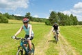Sport couple riding mountain bicycles in