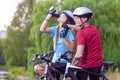 Sport and cycling Concept: Young Caucasian Cyclist Resting Toget