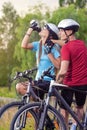 Sport and cycling Concept: Young Caucasian Cyclist Resting Toget