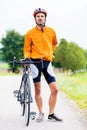 Sport Cyclist with bike having break Royalty Free Stock Photo