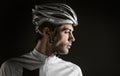 Sport. Cyclist carry a bike on black background. Royalty Free Stock Photo