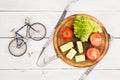 Sport and diet concept - bicycle model, fresh vegetables and ce Royalty Free Stock Photo