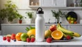 Sport drink bottle mockup with fruits on table, kitchen background Royalty Free Stock Photo