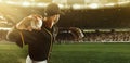 Professional baseball player taking a shot during match in crowed sport stadium at evening time. Sport, win, winner Royalty Free Stock Photo