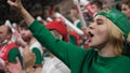 Fans watch baseball. Woman crowd cheer at arena stadium. Couple claps. Bet win. Royalty Free Stock Photo