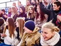 Sport fans clapping and singing on tribunes Royalty Free Stock Photo