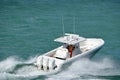 Sport fishing boat speeding across Biscayne Bay off Miami Beach,Florida