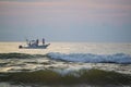 Sport fishing just off the Florida coast at sunrise.