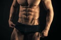 Sport, fitness, bodybuilding. Torso with six pack, ab in underwear