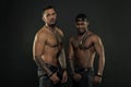 Sport with fitness and bodycare. Men with fit tattooed bodies. African and hispanic men with sexy bare torsos. Fashion