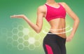 Close up of slim fit woman`s body with trained abs Royalty Free Stock Photo