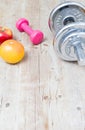 Sport fitness diet concept weights dumbbell and fruit Royalty Free Stock Photo