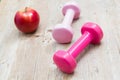 Sport fitness diet concept weights dumbbell and fruit Royalty Free Stock Photo