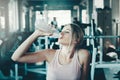 Sport Fitness Exercise and Healthy Lifestyle, Attractive Sports Woman Drinking a Bottle of Water During Taking Rest Break in