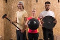 Sport Fitness People Group Crossfit Training Equipment, Young Healthy Man And Woman Gym Interior Royalty Free Stock Photo