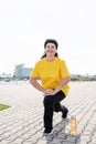 Smiling senior woman warming up stretching outdoors in the park Royalty Free Stock Photo