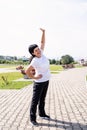 Smiling senior woman warming up stretching outdoors in the park Royalty Free Stock Photo