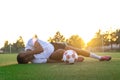 sport, football training, sports injury and people - injured soccer latin player with ball on field Royalty Free Stock Photo