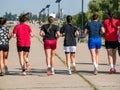 Sport girls team training or running. Girls jogging in a a park