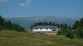 The Sport Hall from the Fundata Resort at Cheile Gradistei with Piatra Craiului Mountains in the background. Royalty Free Stock Photo