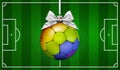 Sport for human rights concept, merry Christmas gift greeting card with soccer ball colored in rainbow colors, on football pitch