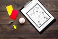 Sport judging concept. Baseball referee. Tactic plan for game, base-ball ball, red and yellow cards, whistle on wooden