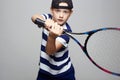 Sport kid Playing Tennis. Little boy Royalty Free Stock Photo