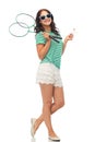 Teen girl with badminton rackets and shuttlecock