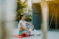 Sport and lifestyle concept - woman doing sports outdoors Royalty Free Stock Photo