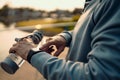 Sport man checking at smartwatch during training and running in the park Royalty Free Stock Photo