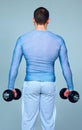 Sport man standing with dumbbells Royalty Free Stock Photo