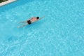 Sport man swimming pool in the resort. on top Royalty Free Stock Photo