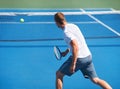 Sport, man and tennis on court with fitness, competition and performance outdoor with serve and energy. Athlete, player Royalty Free Stock Photo