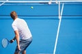 Sport, man and tennis on court with serve, competition and performance outdoor with fitness and energy. Athlete, player Royalty Free Stock Photo
