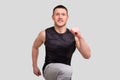 Sport man Warming Up. Pre workout Warm up Close Up. Man Doing Excersises Isolated. Runner Warming Up Royalty Free Stock Photo