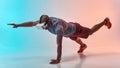 Sport in a new way. Full length of young african man in sports clothing doing plank while wearing virtual reality Royalty Free Stock Photo