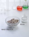 Sport Nutrition Supplement in lab. Whey protein and BCCA.