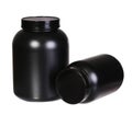 Sport Nutrition, Whey Protein and Gainer in Black Plastic Jars Royalty Free Stock Photo