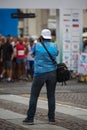 Sport Photographer Shooting Marathon Runners Ready for the Race at Starting Line