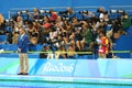 Sport photographers shooting swimming competition at Olympic Aquatic Center during Rio 2016 Olympic Games