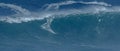 Sport photography. Jaws swell on International surfing event in Maui, Hawai 2021 December.