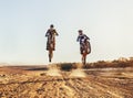 Sport, racer and motorcycle in action for competition on dirt road with performance, challenge or adventure
