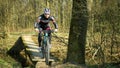 OLOMOUC, CZECH REPUBLIC, MARCH 28, 2020: Sport racing cyclist bike way creek in nature in forest river bikingman people biking